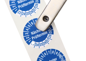 Lochzangen für Prüfplaketten.