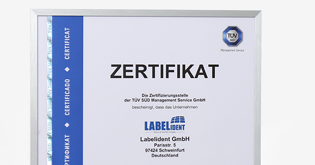 ISO 9001 Zertifikat von T&Uuml;V S&Uuml;D f&uuml;r Labelident GmbH als Nachweis eines gepr&uuml;ften Qualit&auml;tsmanagementsystems.